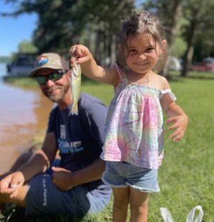 Brandon lester little girl with fish