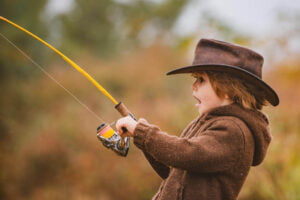 Excited boy fishing