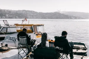 Guys fishing on a dock