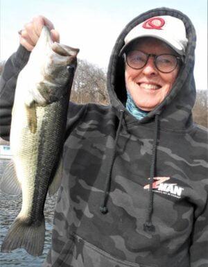 Neds wife Patty with a dandy early winter largemouth