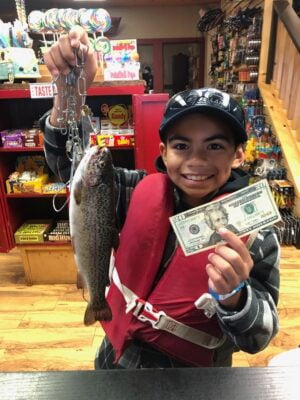 bass lake fishing derby boy with fish